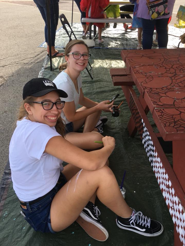 Oswego Downtown Association volunteers painting